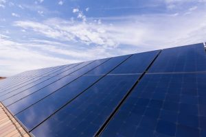 Solar panels under clear blue sky installed on a Bay Area home — choose licensed experts to avoid the risks of cheap solar battery systems.