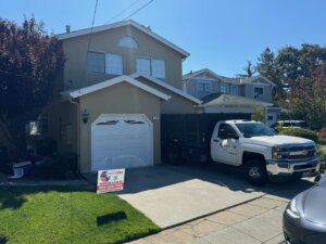 Completed roof replacement with solar panels and Tesla battery backup on a San Carlos, CA home by Home Pro Roofing and Solar
